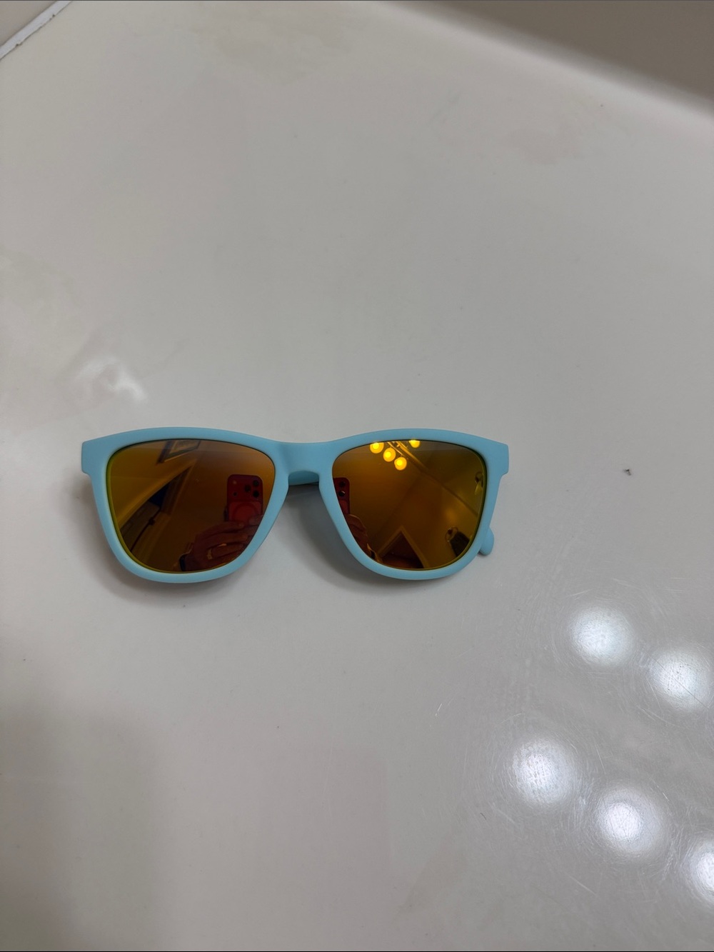 Goodr- light blue Sunglasses with Amber Mirrored Lenses
